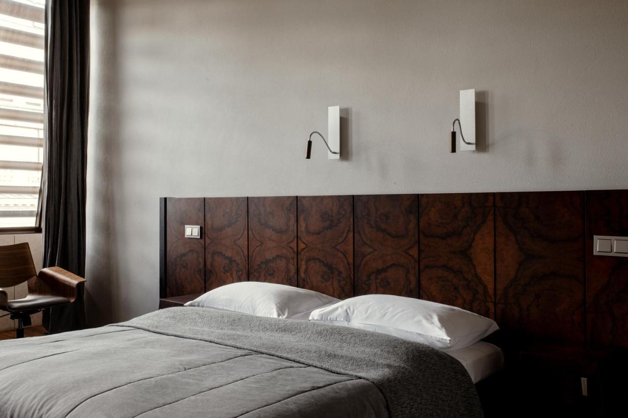 Hotel Monopol วรอตซวาฟ ภายนอก รูปภาพ A bedroom at the Hotel